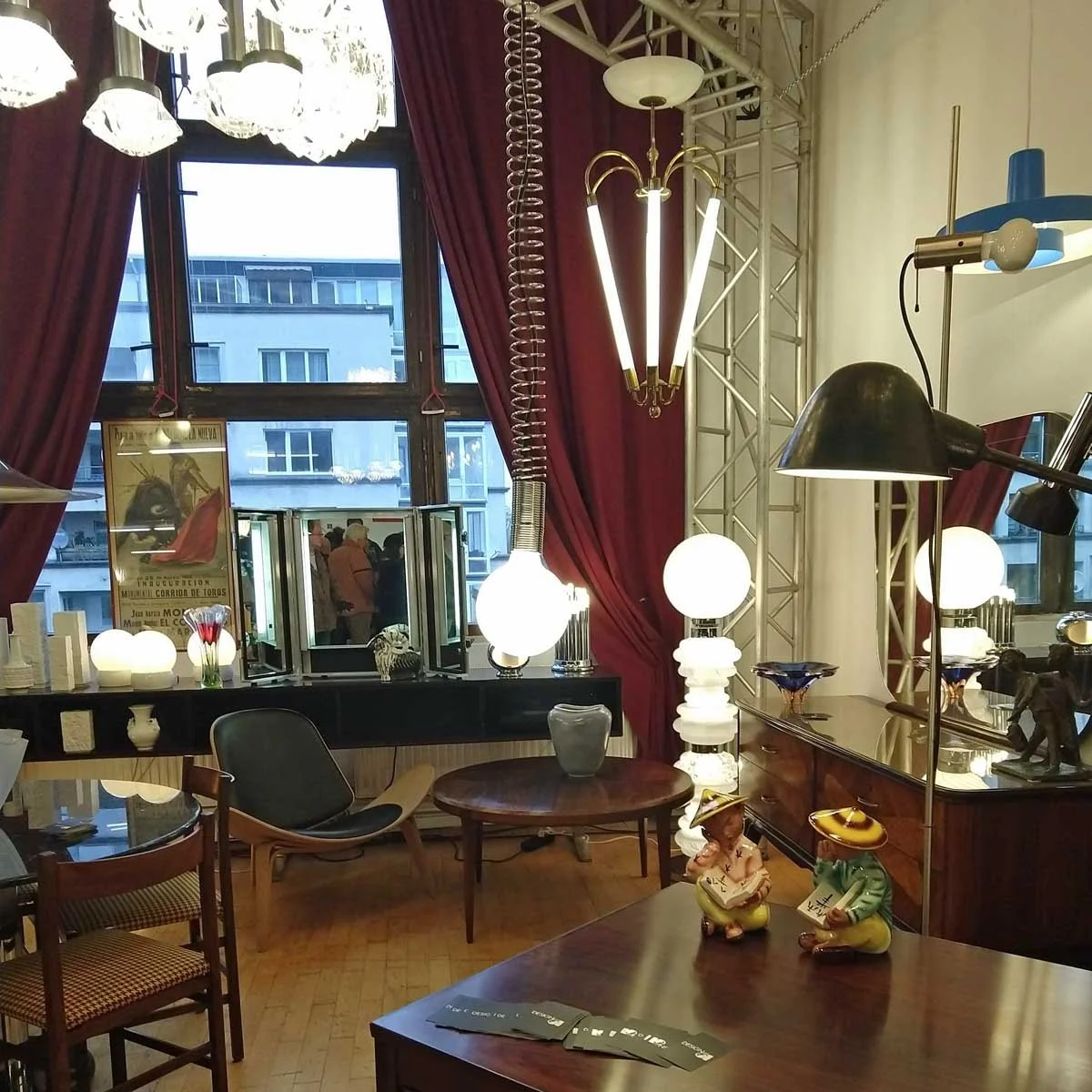 Berlin antique show with vintage furniture and decor, one of the sourcing stops for finding one-of-a-kind pieces.