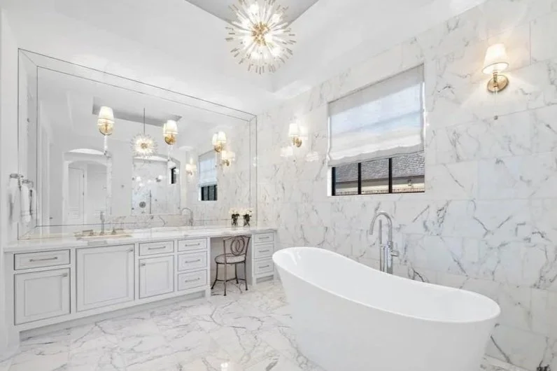 All marble bathroom brings glamour and luxury to this spa like luxury bathroom retreat