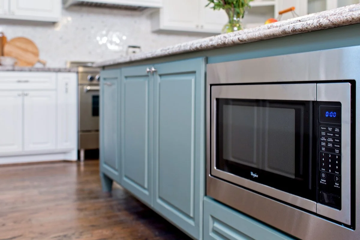 New construction meeting with builder and homeowners discussing interior design selections for Castle Pines home