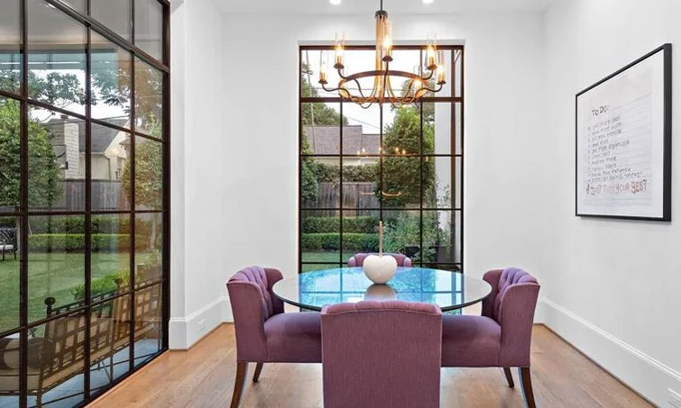 Modern sunny breakfast room in Highlands Ranch designed by Jamie House Design