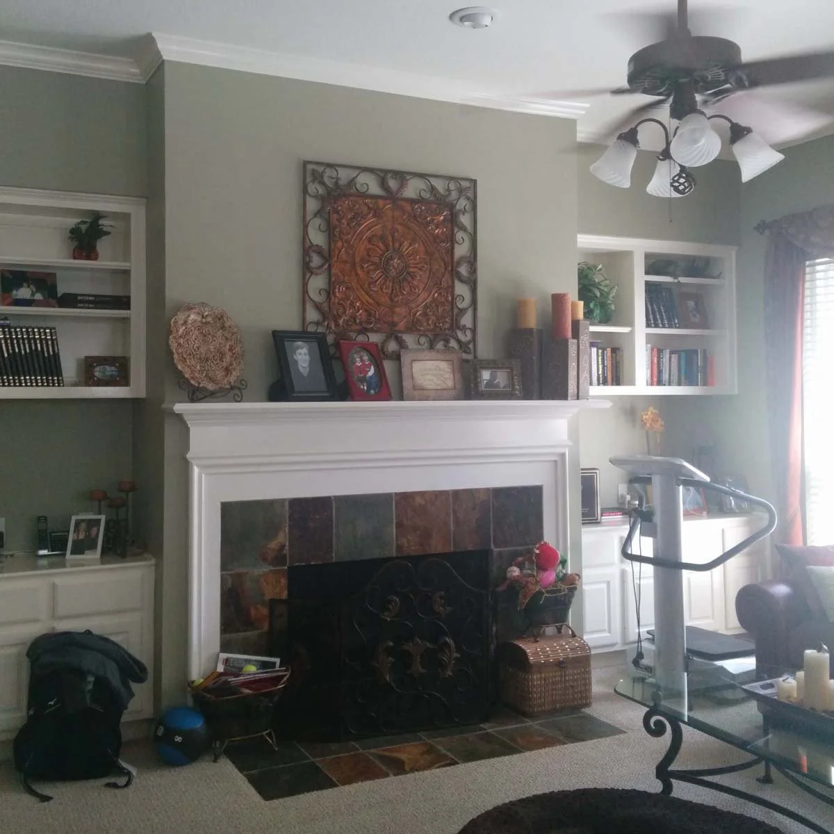 Before a family room renovation in Centennial Colorado home showing transformation from dated to modern design.