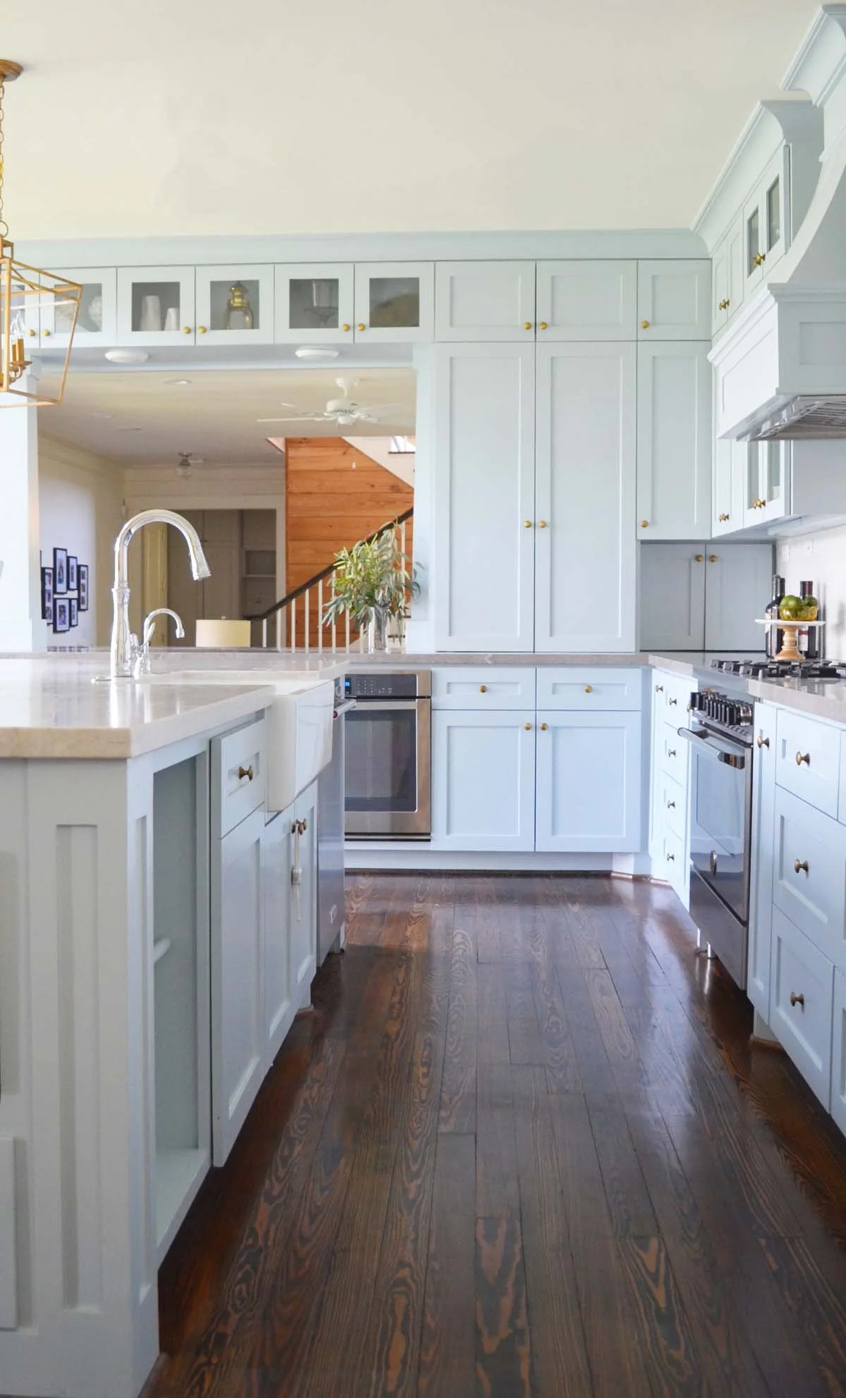 Expansive Denver bungalow remodel included custom kitchen design and millwork in custom high-end finishes.