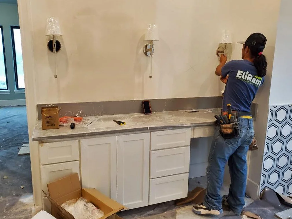 Lighting installation in new construction home in Highlands Ranch designed by Jamie House Design