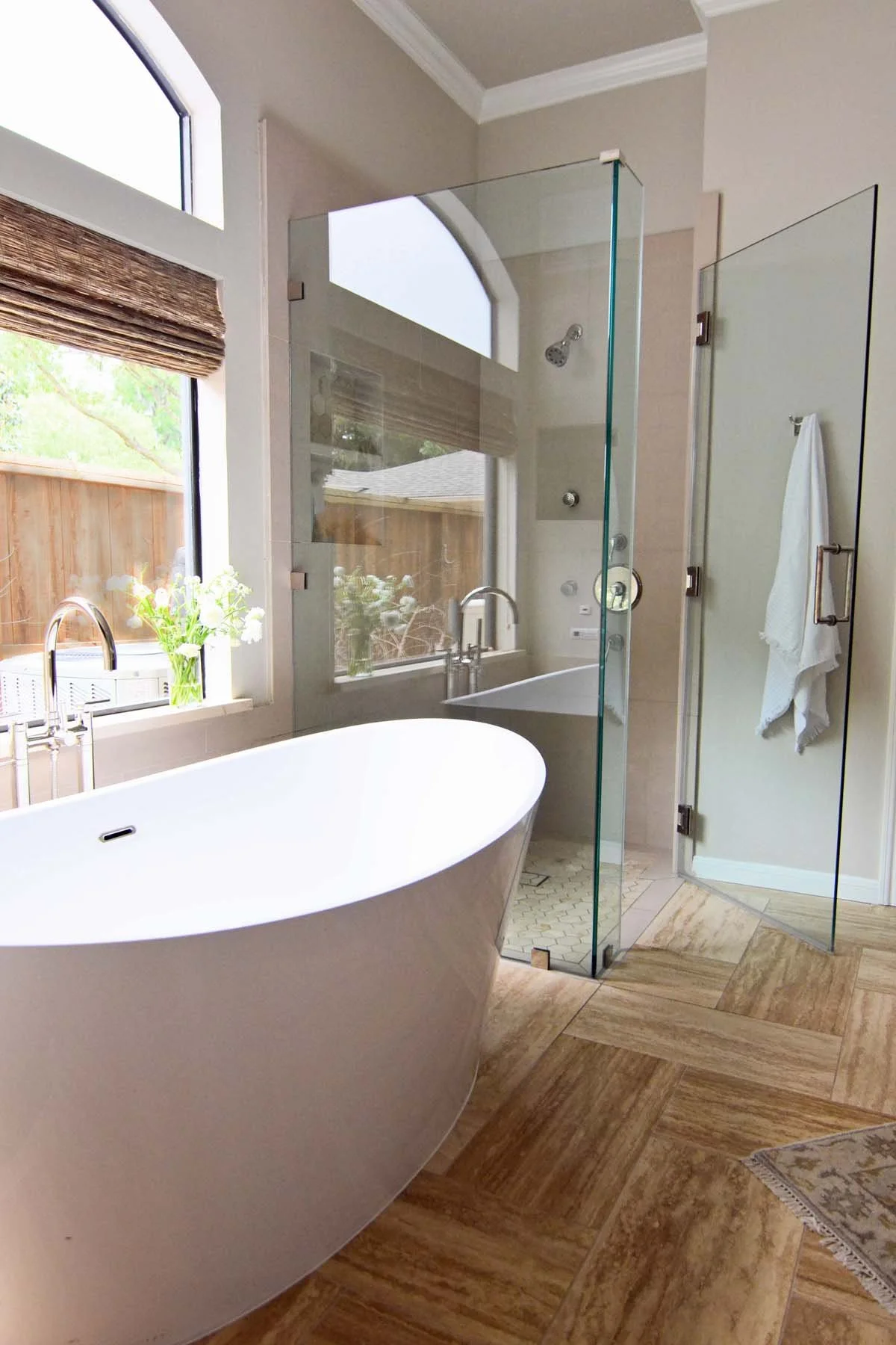 Freestanding bathtub in primary bathroom renovation Highlands Ranch CO by Jamie House Design
