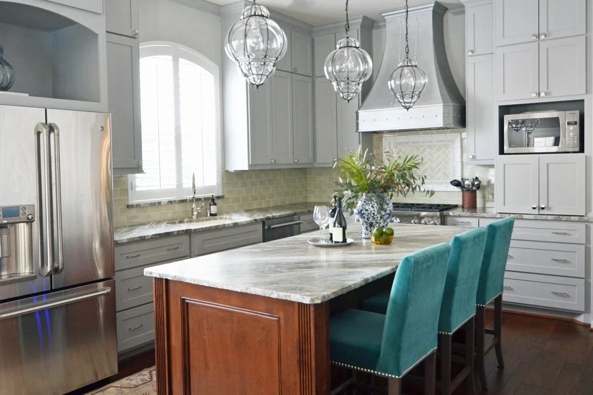 Hiring an interior designer to design your kitchen helps decide if you have space for an island.