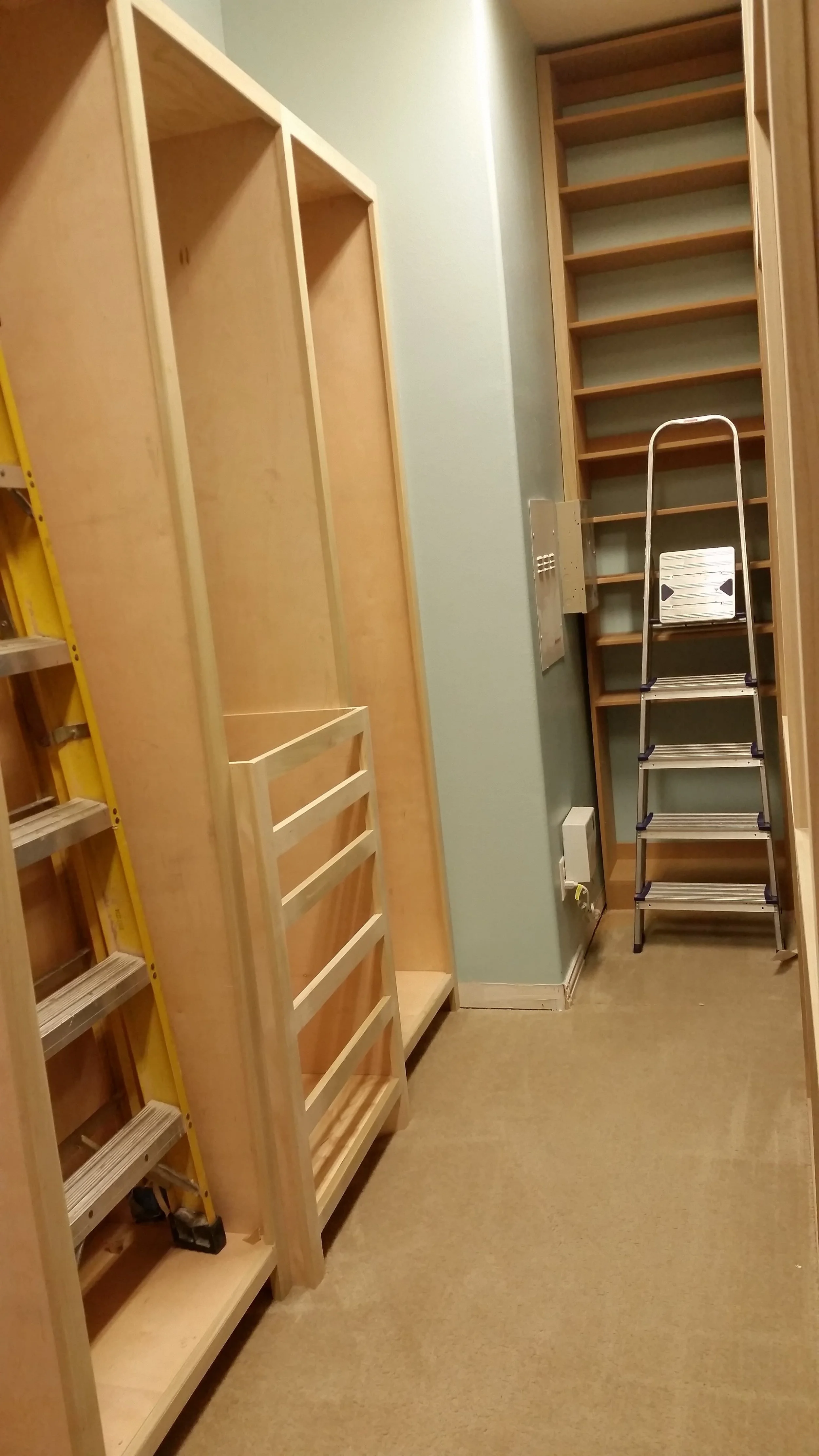 Installation of a custom designed closet by Denver interior design firm Jamie House Design