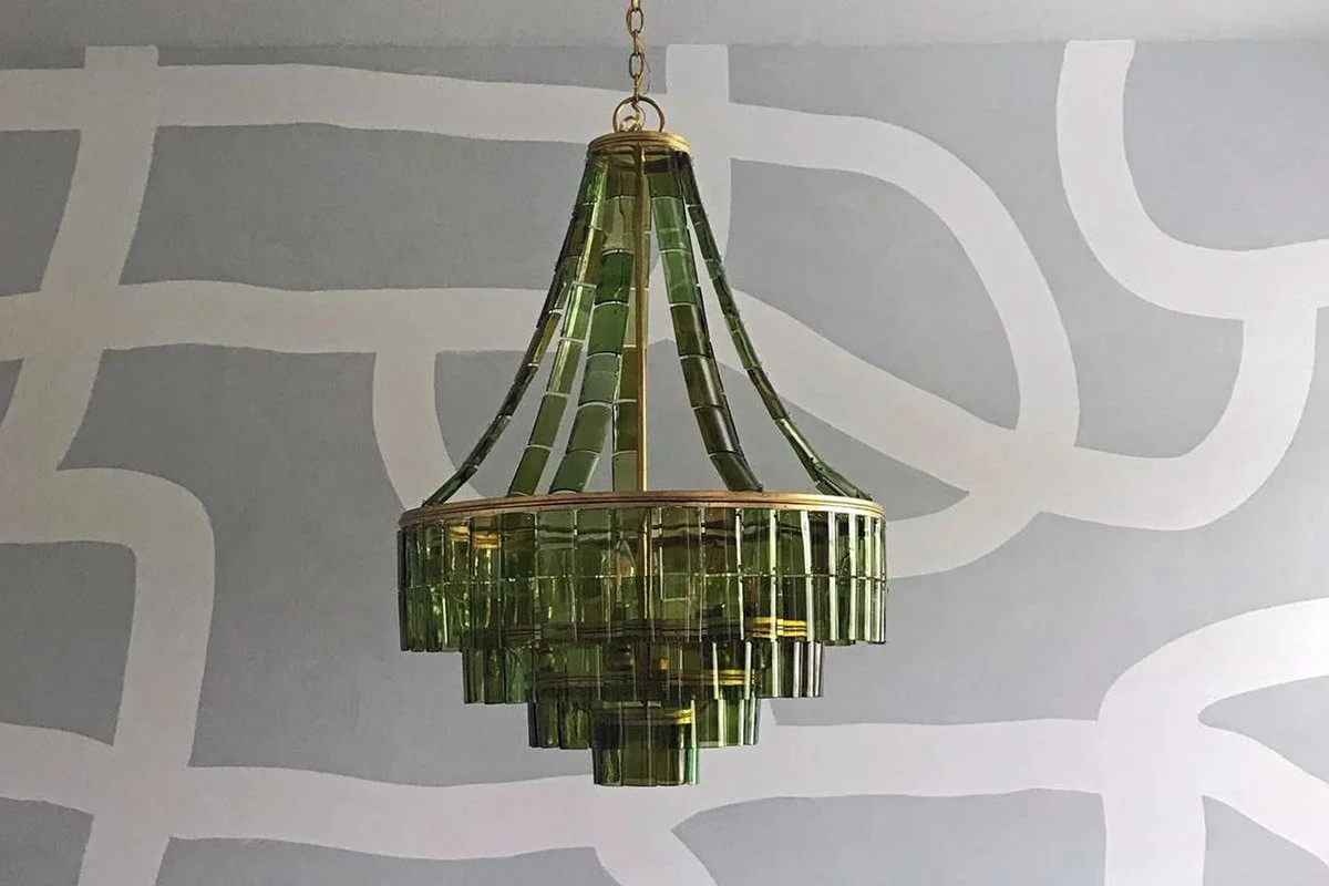 Statement chandelier in dining room designed by Centennial CO interior designer Jamie House Design