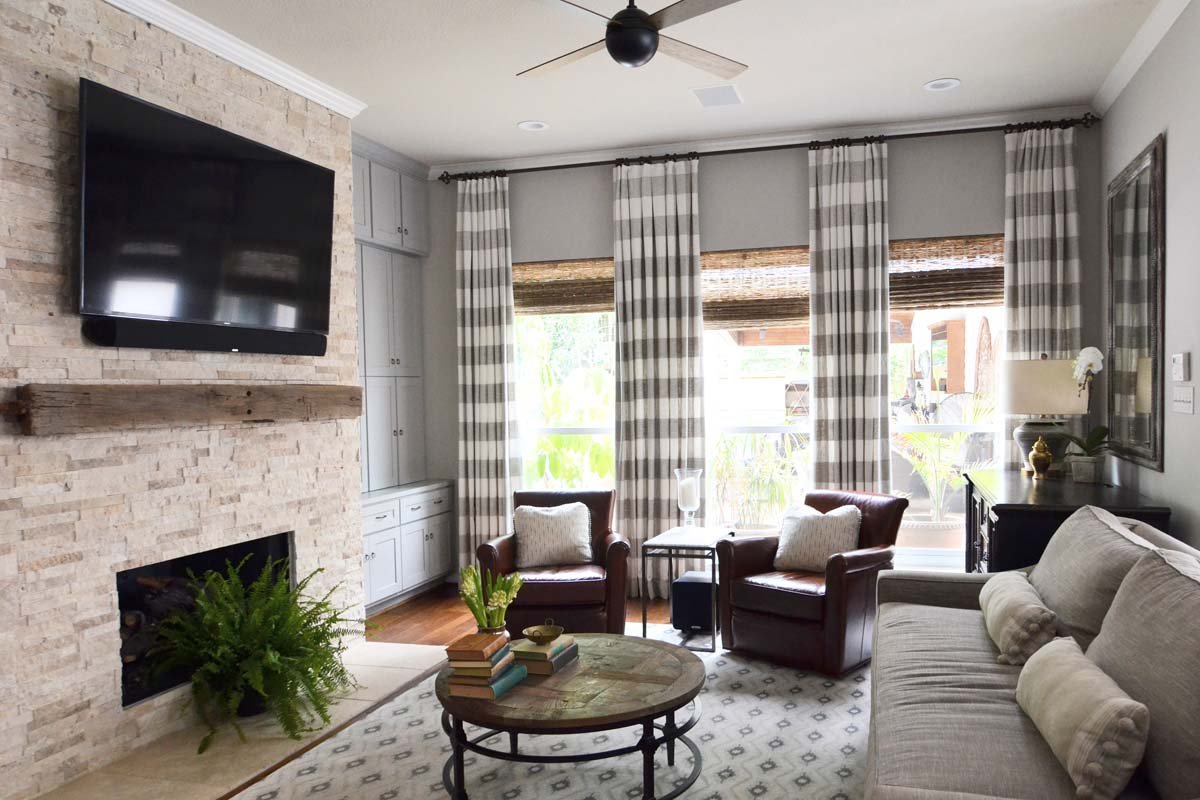 After family room renovation in Centennial Colorado home showing transformation from dated to modern design.