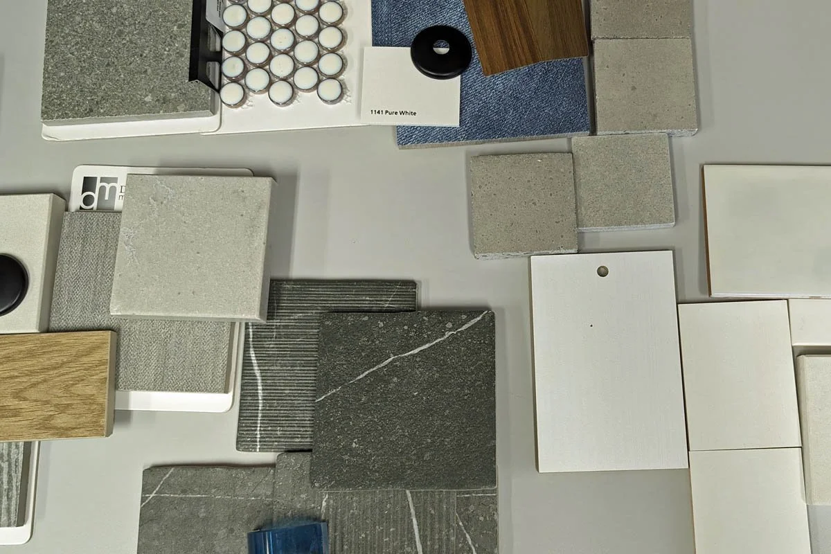 Tile selection meeting during Jamie House Design full-service interior design process.