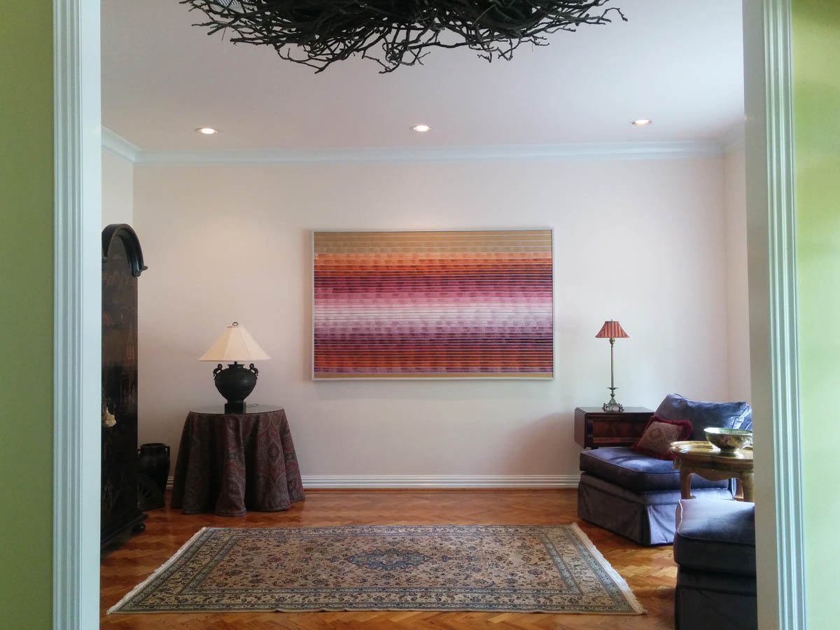 Formal room redesign in Centennial CO with bold colors and art.