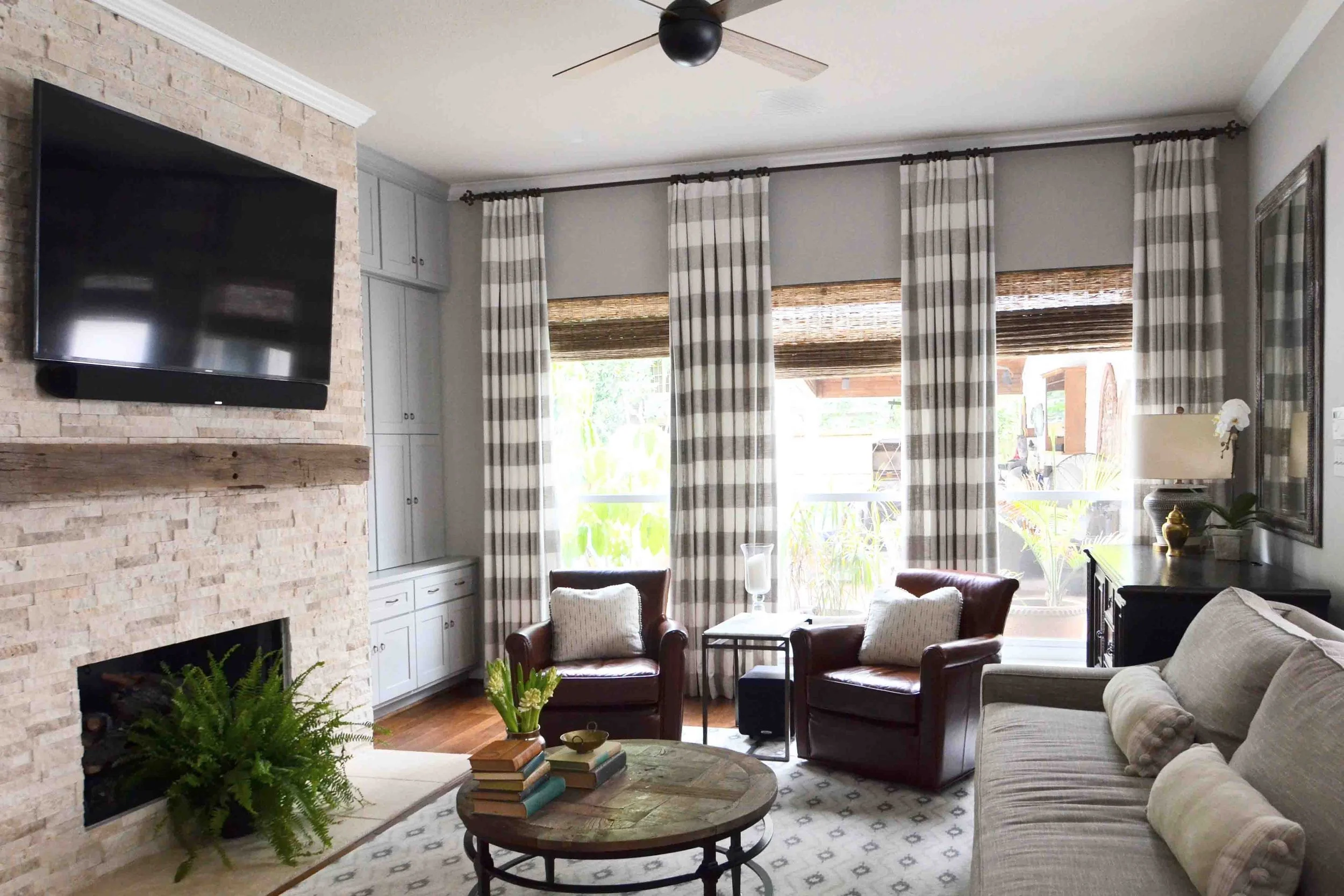 Testing paint samples Colorado light Highlands Ranch interior design process