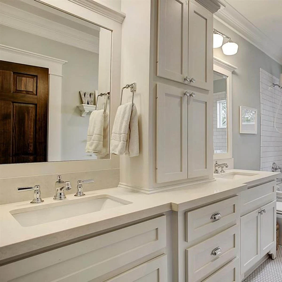Cabinetry design in a hall bath as an upgrade determined during design consultation with Jamie House Design