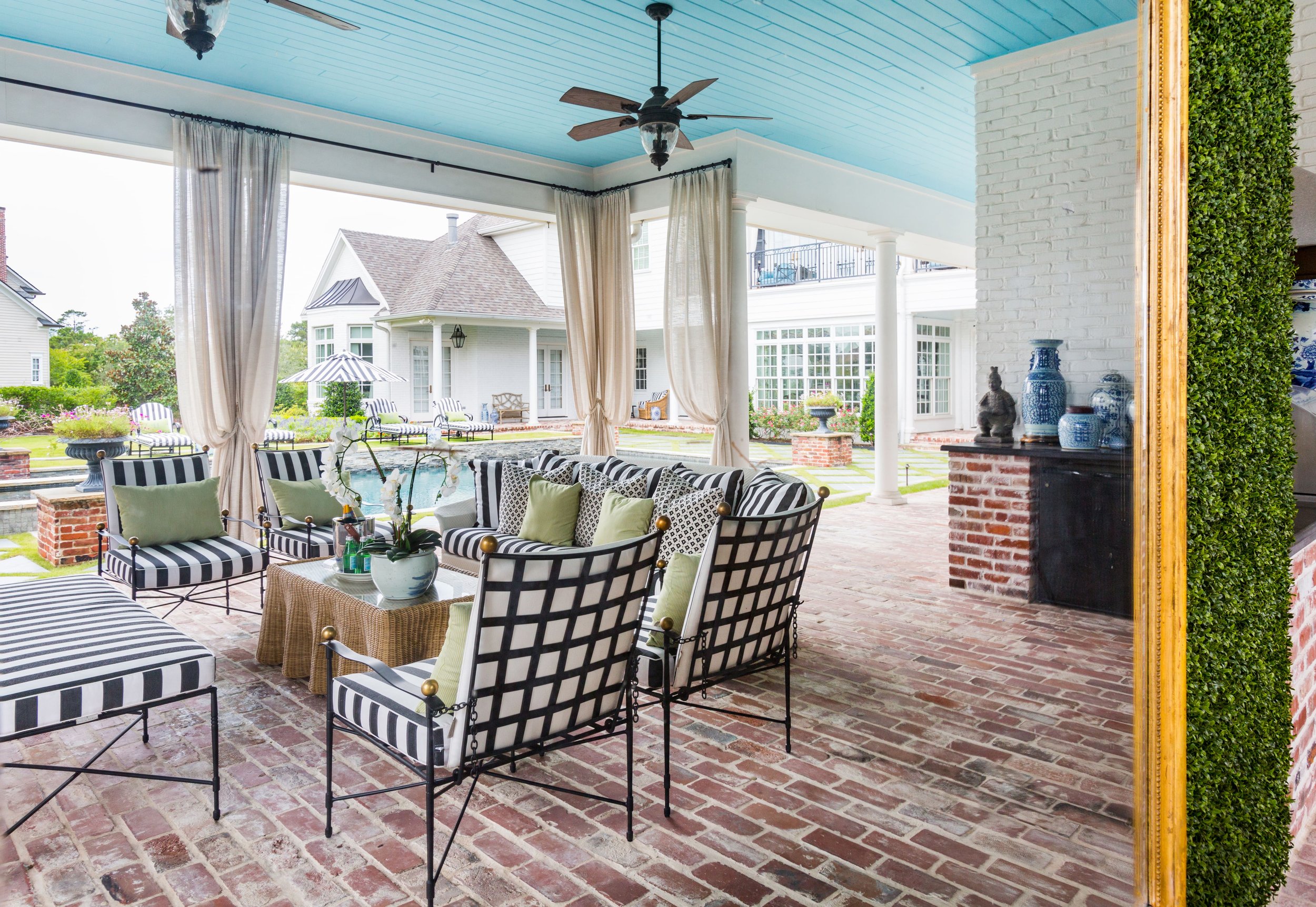 Mirror reflection of Cherry Hills Village outdoor space designed by Denver interior designer Jamie House