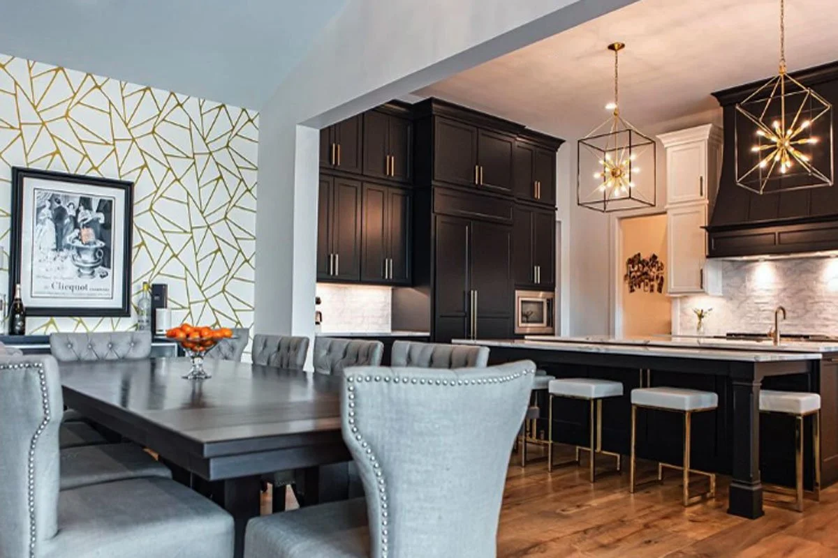 Kitchen interior design showing mixed metals with brass fixtures and black hardware by Jamie House Design