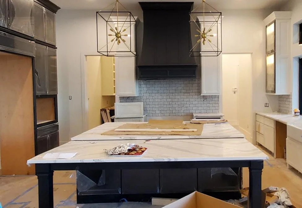 Modern kitchen designed by Jamie House Design under construction