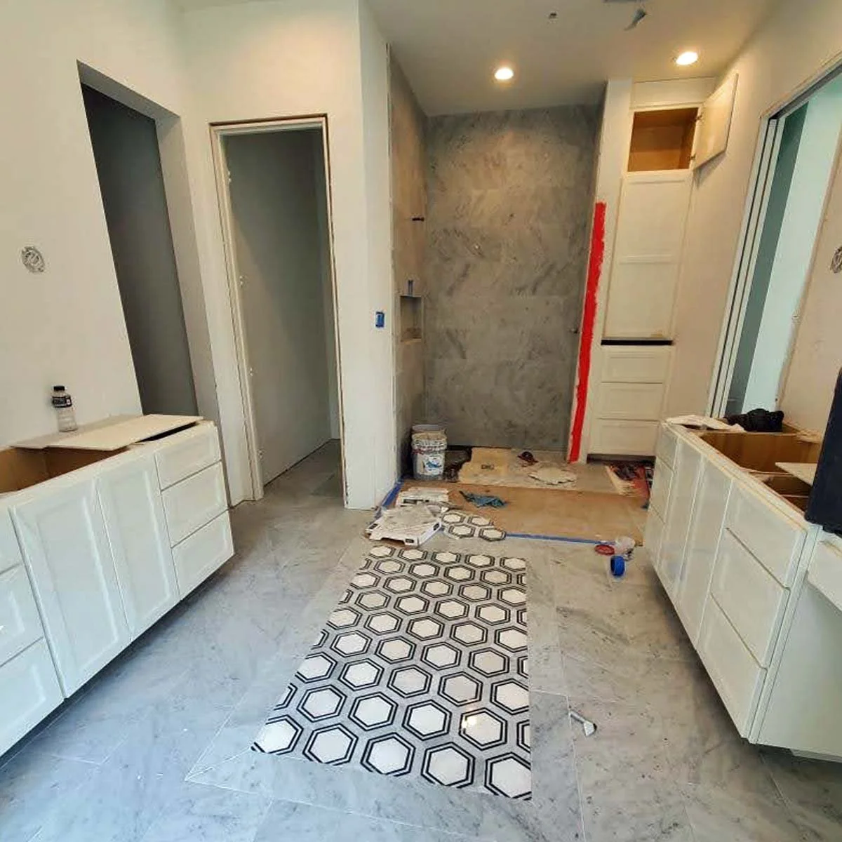 Primary bathroom under construction designed by Jamie House Design in Castle Pines CO