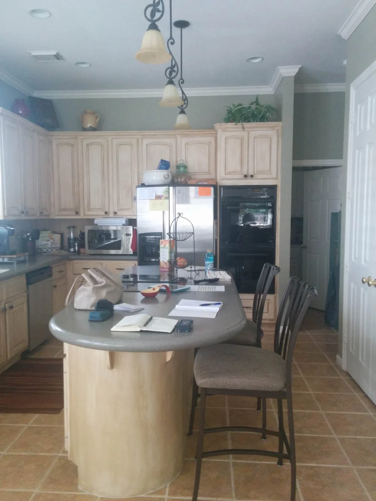 Typical suburban kitchen in Highlands Ranch before a full remodel