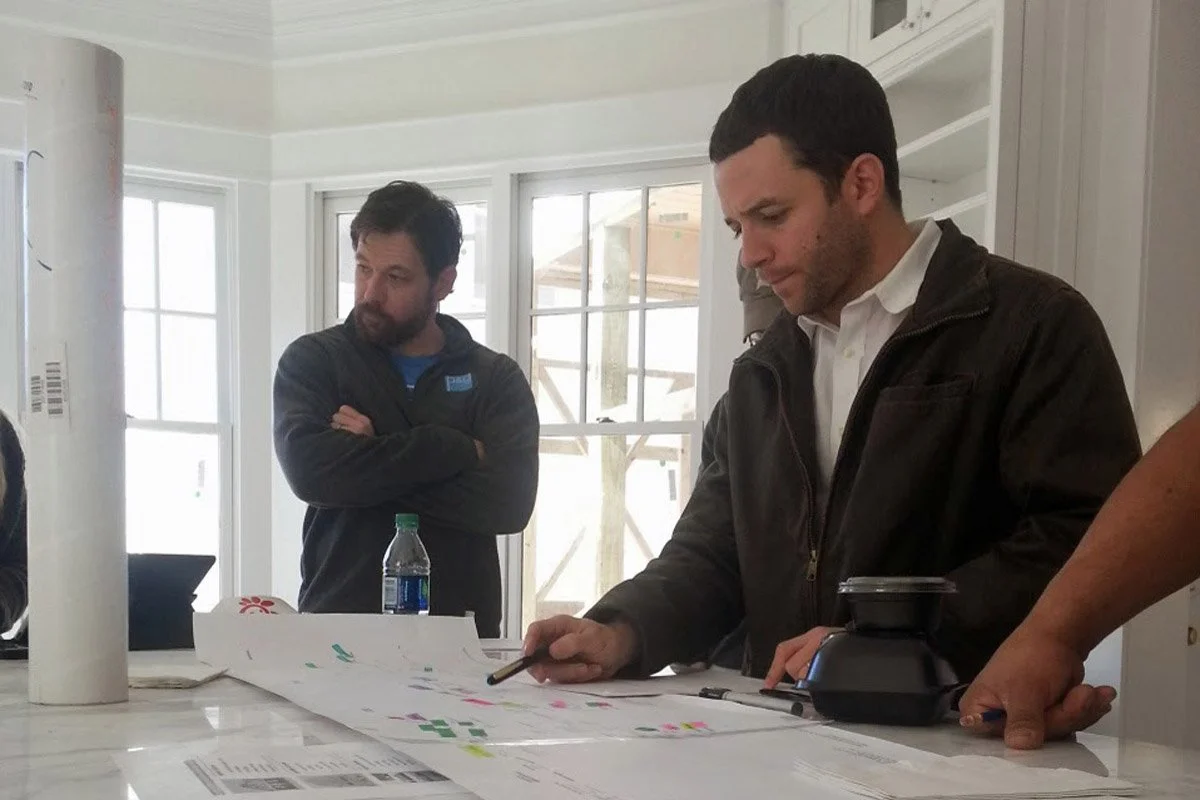 Jobsite meeting with the interior designer, architect and contractors are a weekly thing at Jamie House Desig.