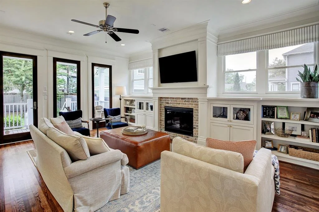 Highlands Ranch family room with toy storage and stylish furniture