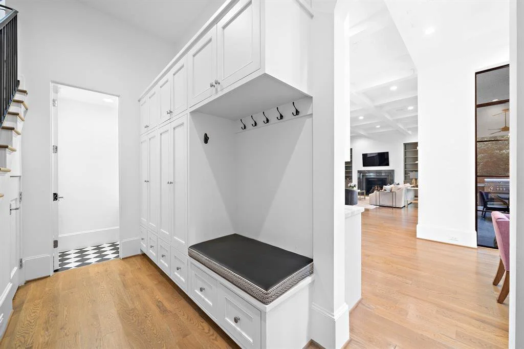 Built-in mudroom system with individualized storage zones
