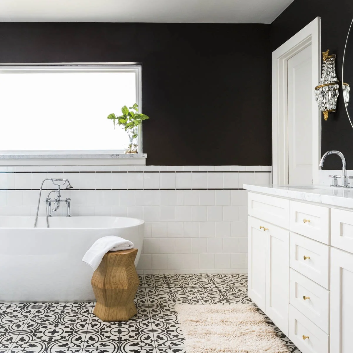 Primary bathroom renovation in Littleton CO with a beautiful freestanding bathtub and double vanities.