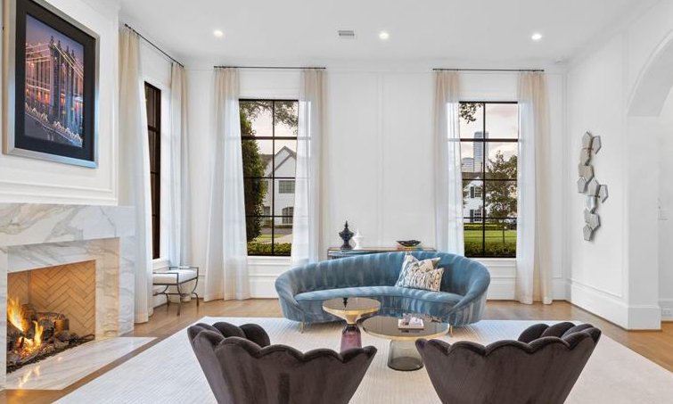 Formal living room in Highlands Ranch designed with custom furniture.