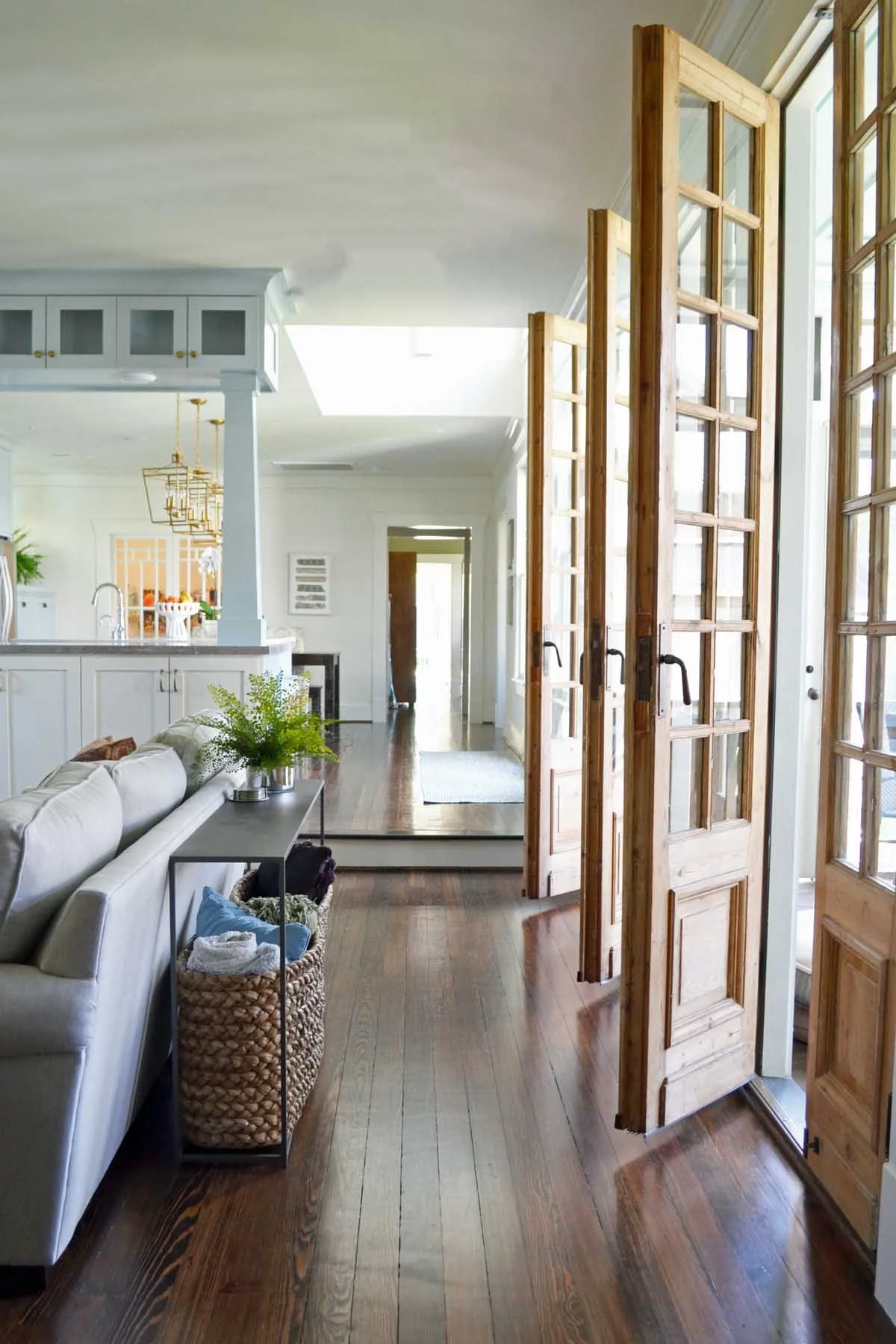 Antique doors were added to this Denver bungalow renovation to lead to the outdoor entertaining area.