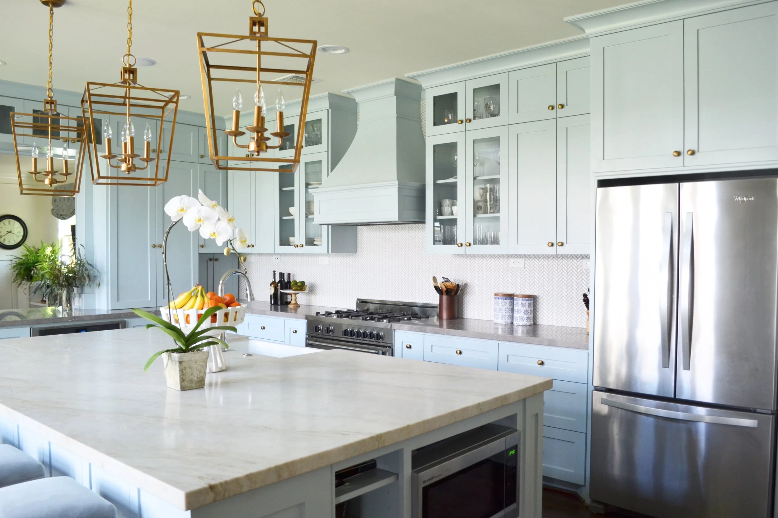 Custom kitchen island and open plan renovation in Centennial Colorado home showing modern functionality