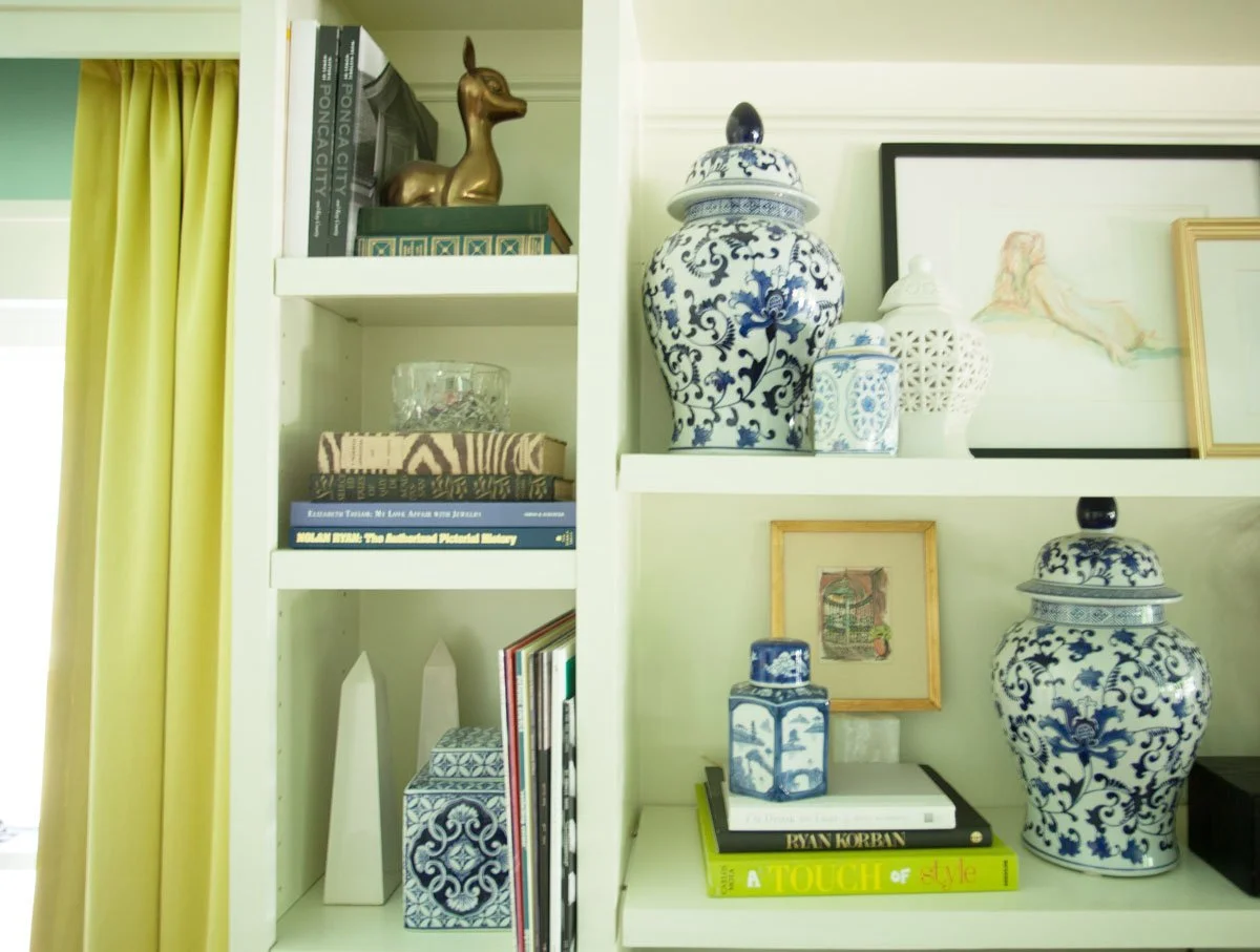 Using proportion to create balance in a built-in bookshelf styling.