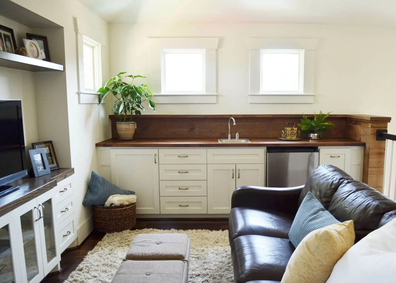 Compact sitting area in Littleton historic home basement