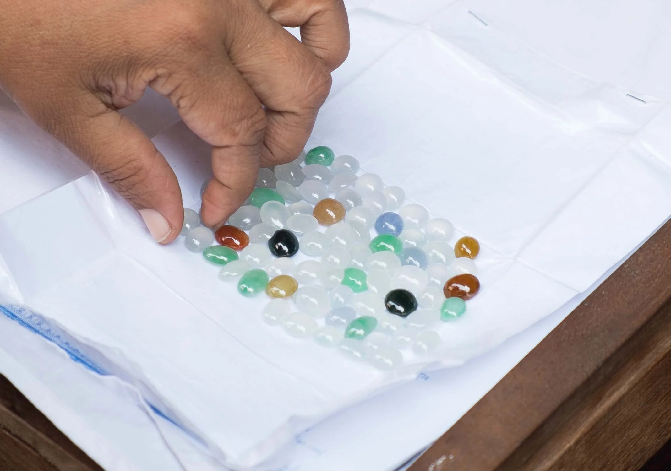 Medium quality white jade along with a variety of other colors this buyer is looking for.