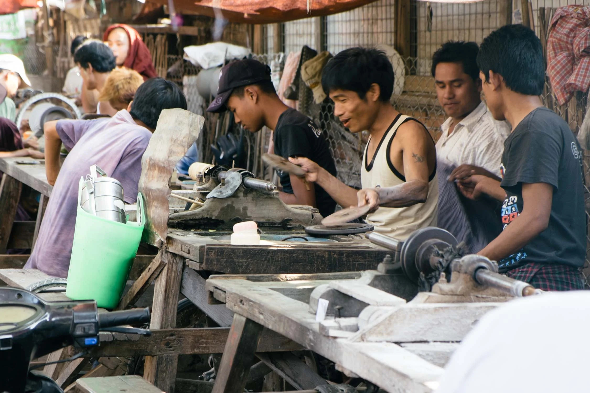 Long line of polishers and cutters.