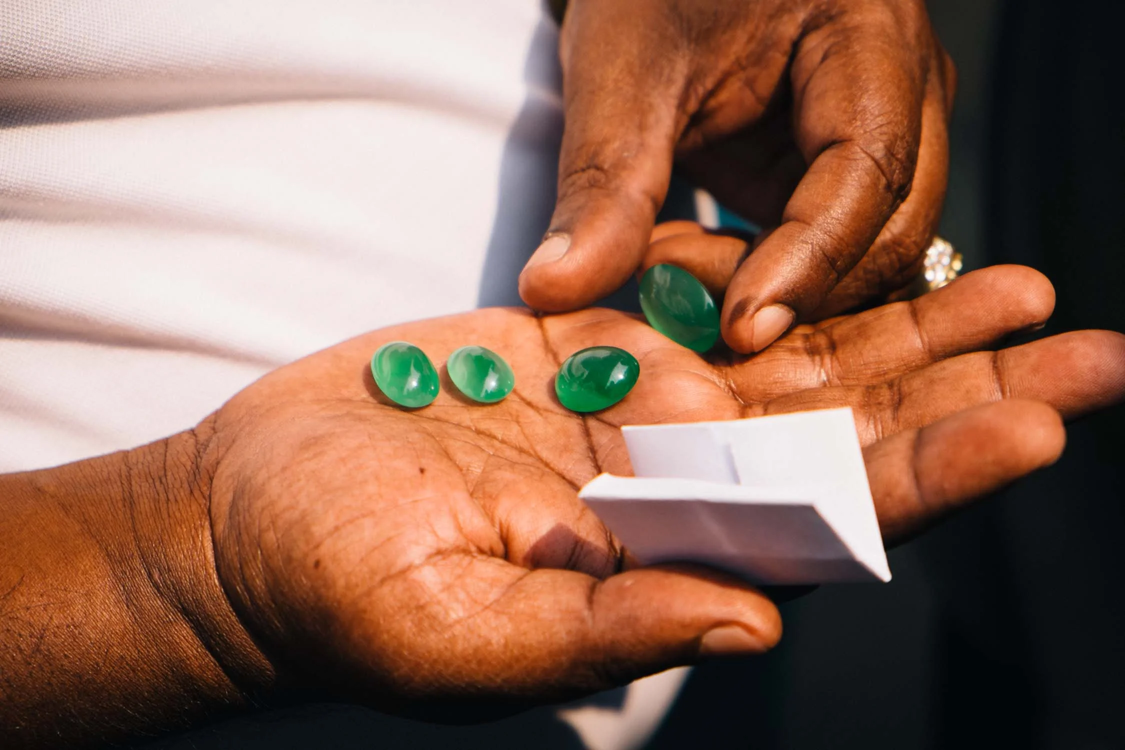Some of the finest jade is sold while walking around the market and not at any trading table.