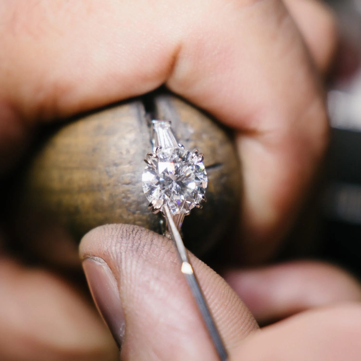 The stones are then set in the platinum, and the ring finally polished.