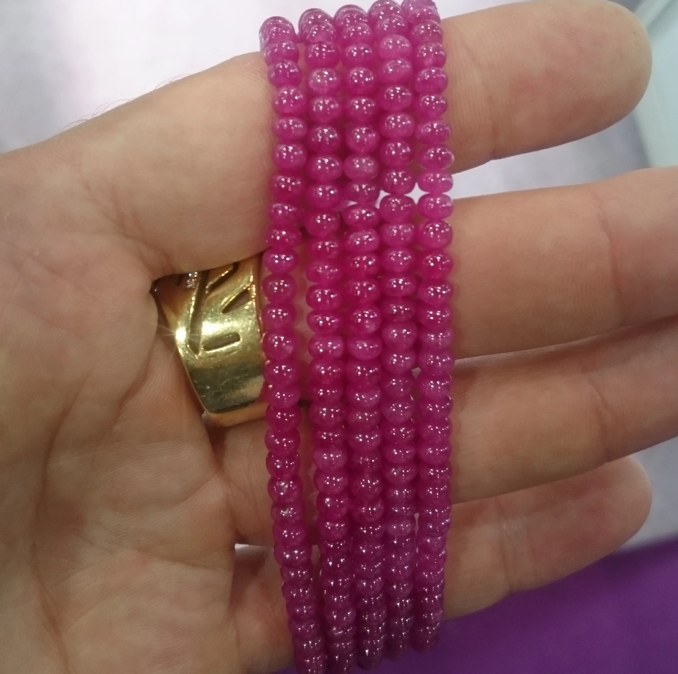 Smooth surface ruby beads