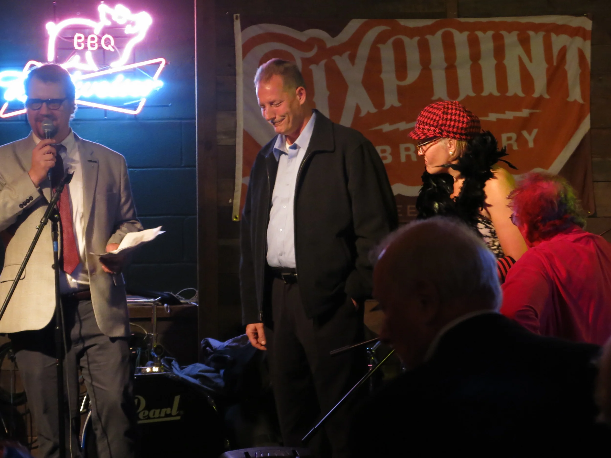 James Hill (left) of the Brooklyn Chamber of Commerce presents the award to electrician Danny Schneider
