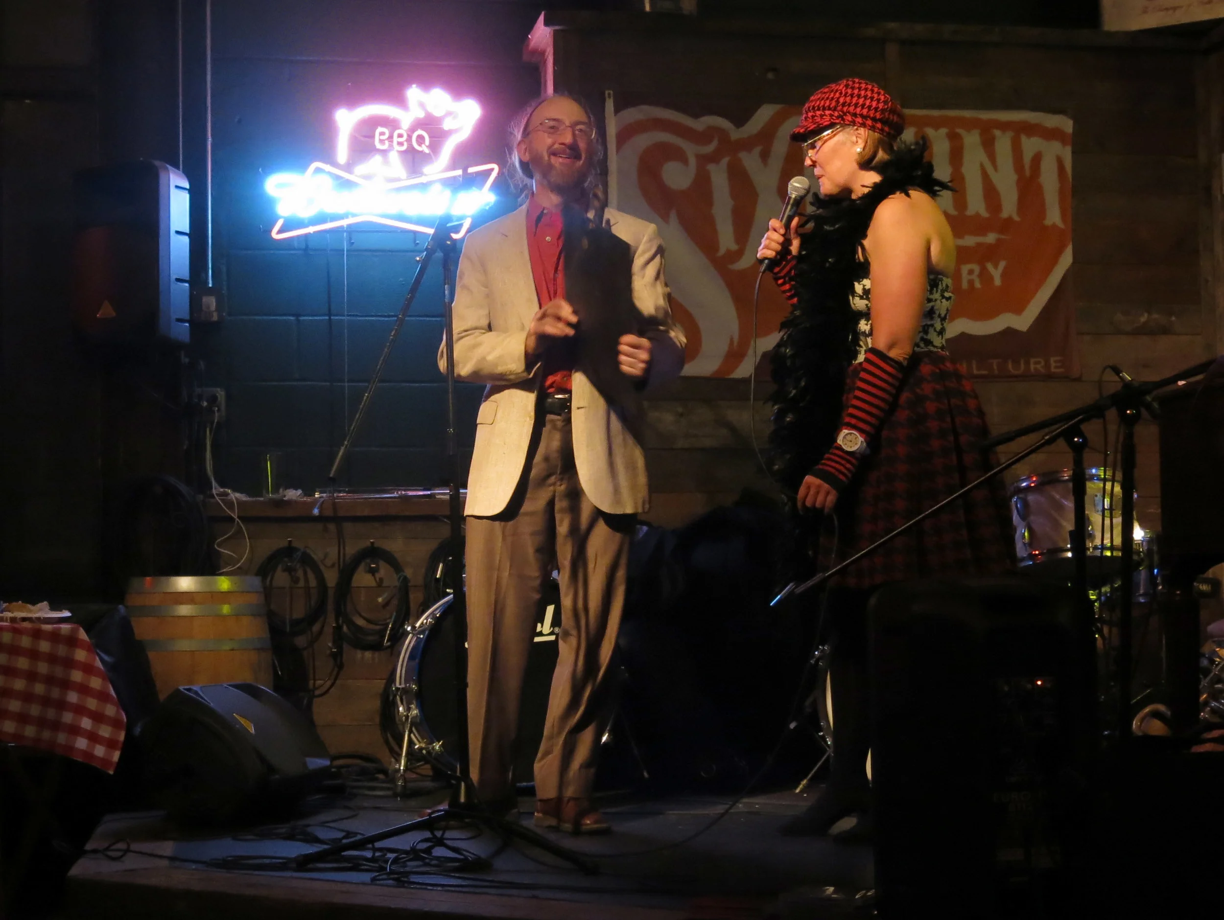 Peter Rothernberg (lefti holding his award, and Carolina Salguero (right) 