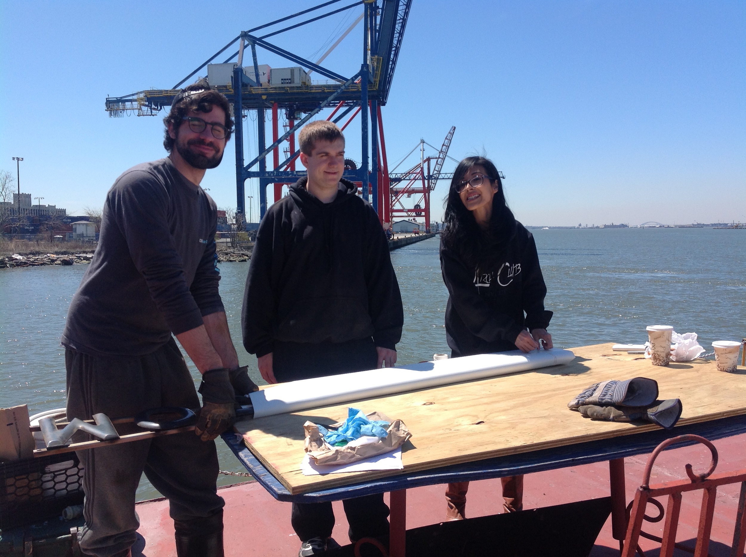 140421_0253 on deck re-wrapping historic artifacts flooded by Sandy.JPG