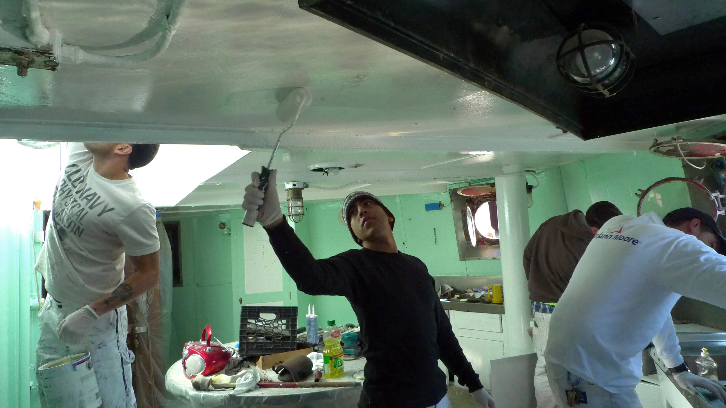 DC 9 trainees painting Mary Whalen's Galley