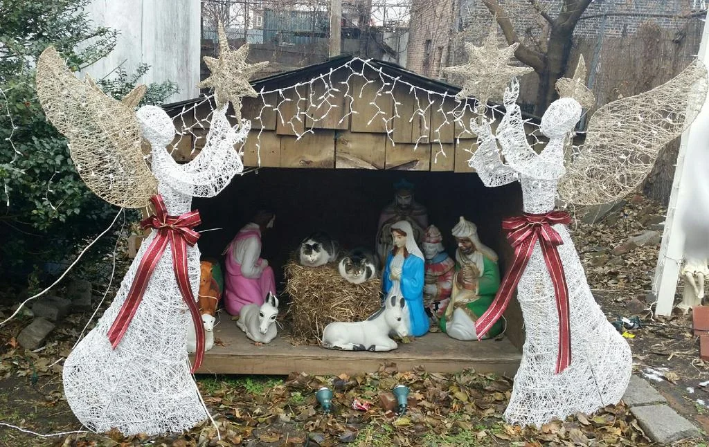 Cat creche on Van Brunt Street opposite the VFW post. Before the baby Jesus arrives, the cats keep his spot warm. 