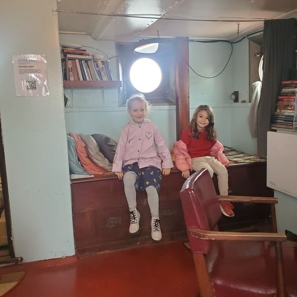 2 girls in captain cabin.jpg