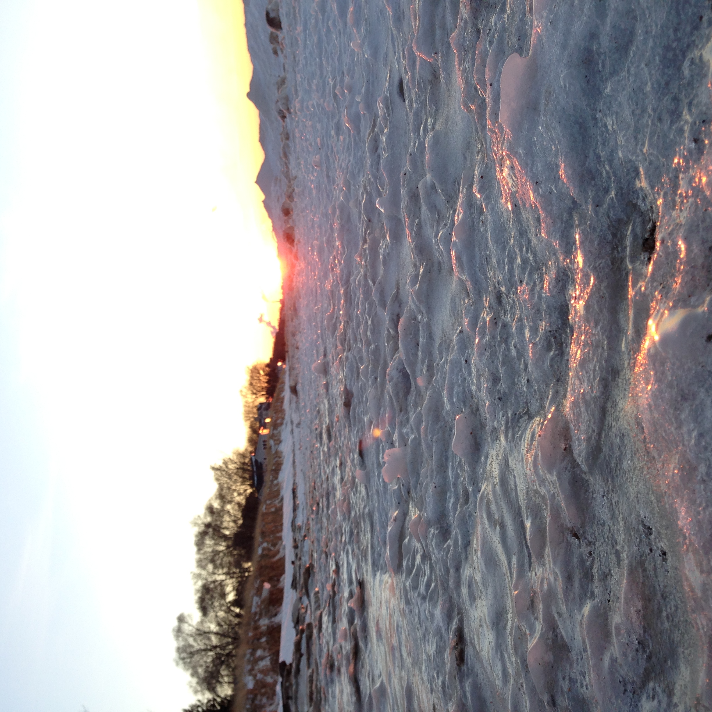 There was a coating of ice over the sand.
