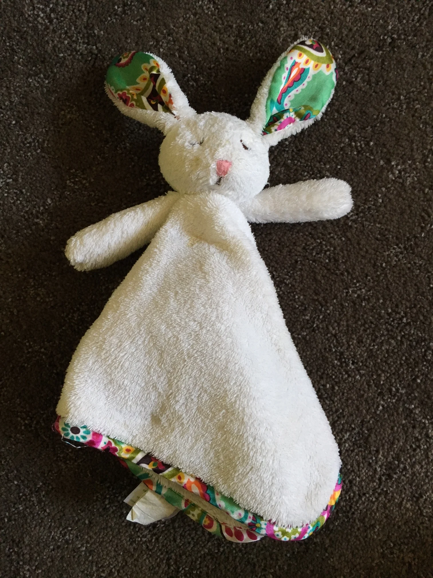 Here's what Lovey Bunny currently looks like. One eye missing? Kind of? He's been slobbered on, A-LOT!