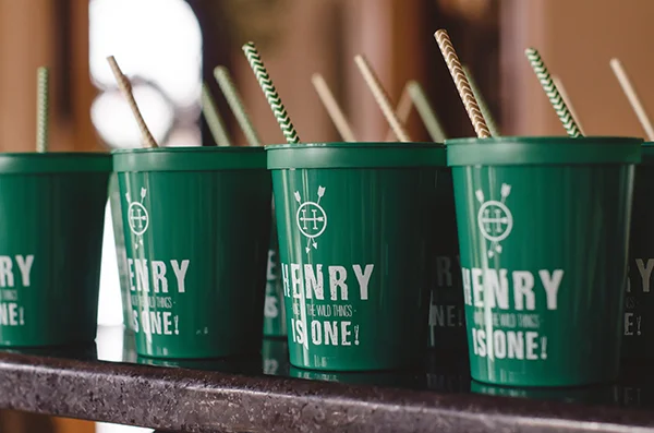 one can never have enough custom cups in their life! this design features henry's logo i created for him! i played off of his name and added an arrow that points to the left, since his middle name is west! we ordered two different chevron straws because we couldn't decide what color we liked better! 
