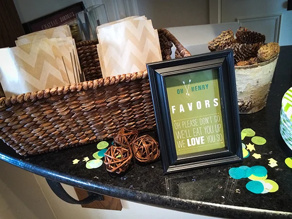 we presented the favors in a kraft chevron paper sack and guests took home "o henry" chocolate bars! they also got to take home pictures from the photo booth!