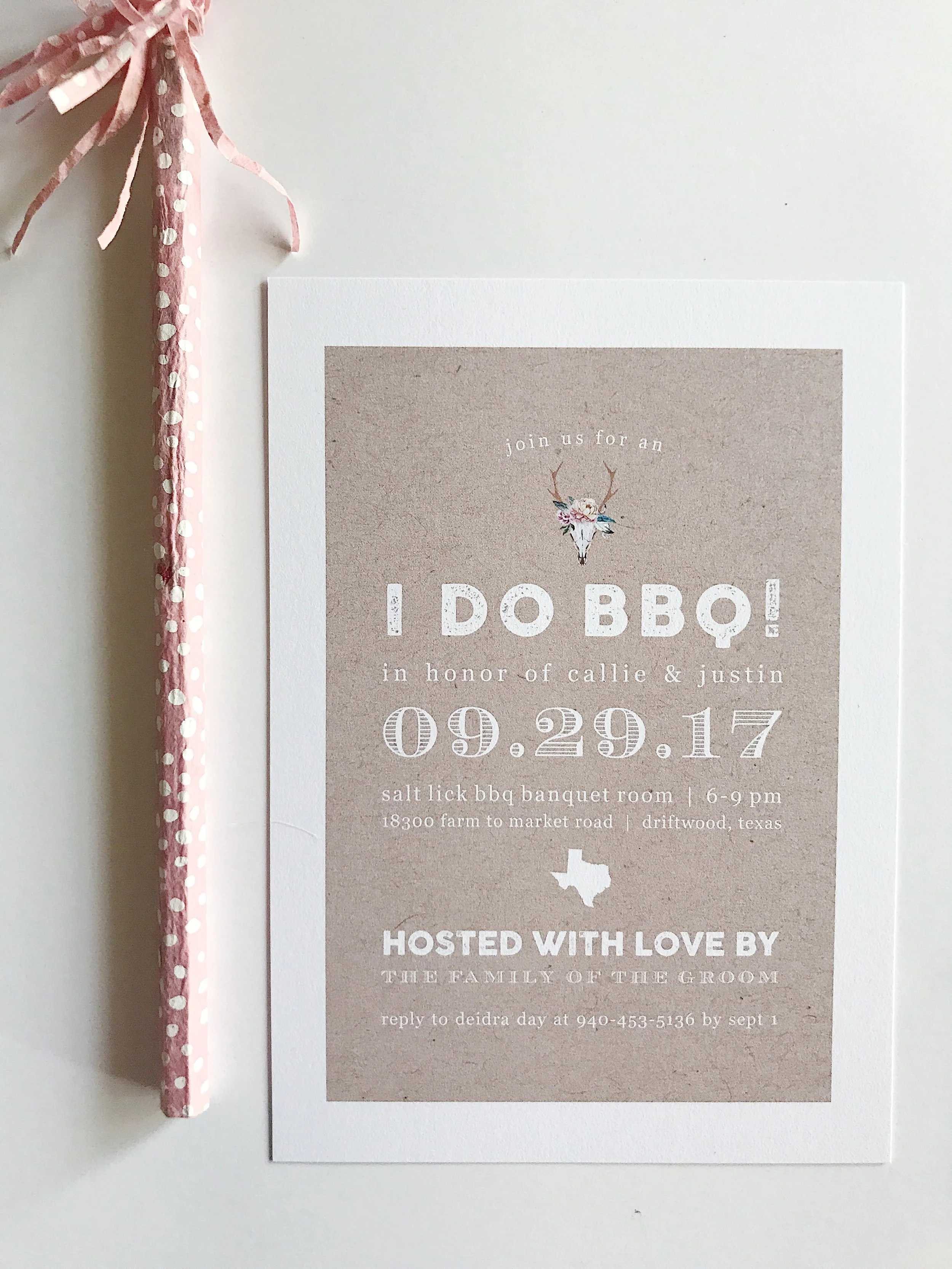 an elegant skull and floral rehearsal dinner postcard