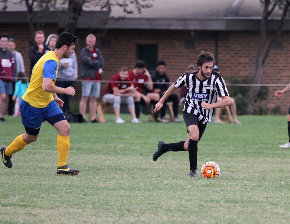 Jason Minglis bringing up the ball