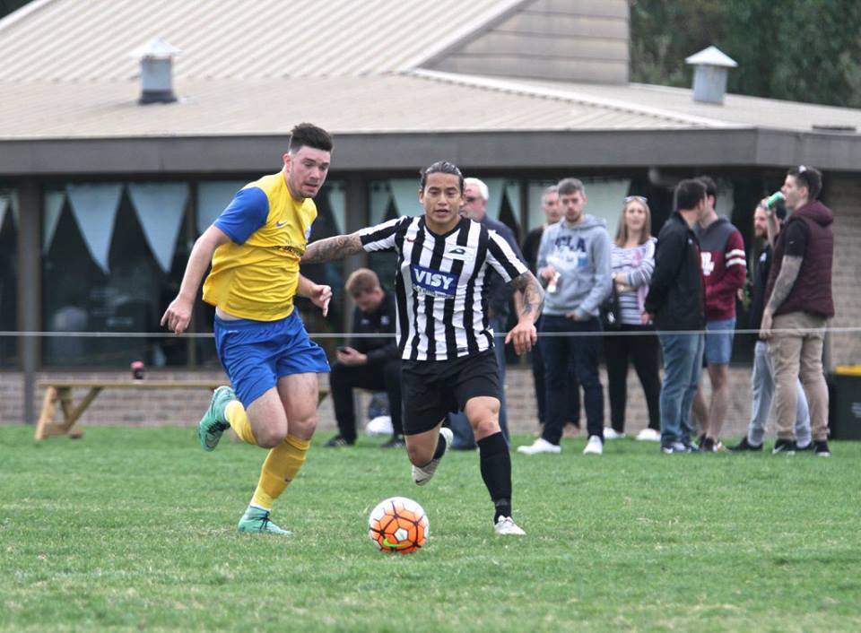 Brandon Wong holding off the Whitehorse attack.