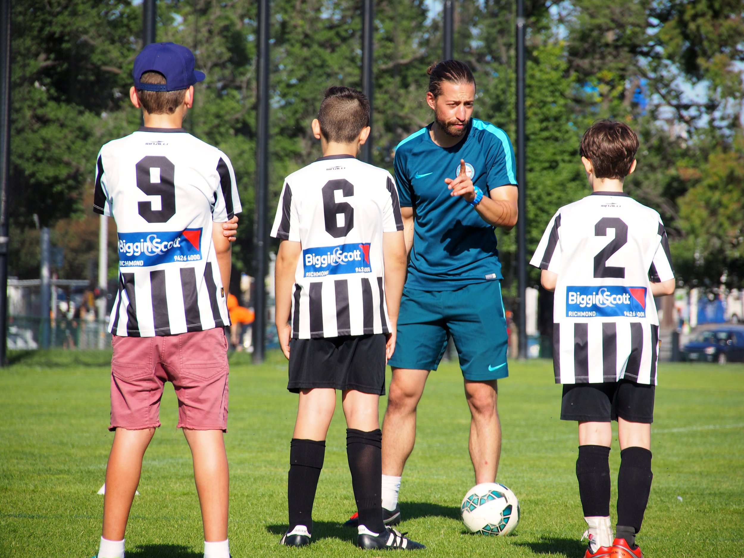 Receiving instructions about some drills from coach, Adam.