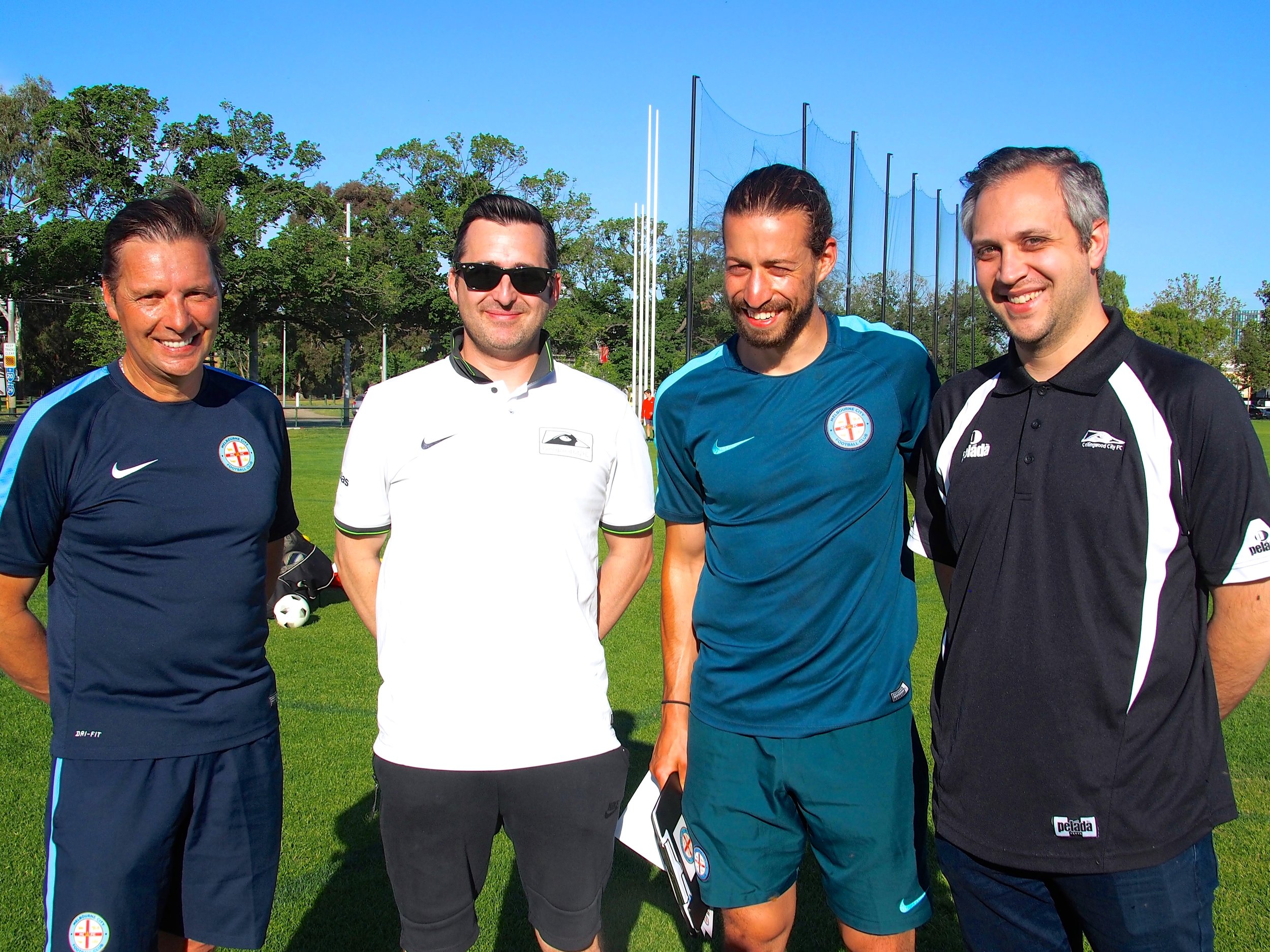 Collingwood’s Ross Evans and Drew Dickson thank Melbourne City coaches, Oliver Schulze and Adam Centofanti, for the training session